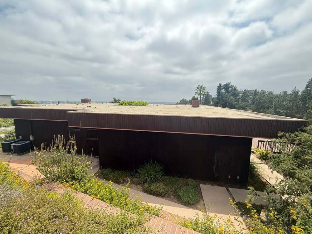 Metal fascia band + parapet coping in Harvard Heights