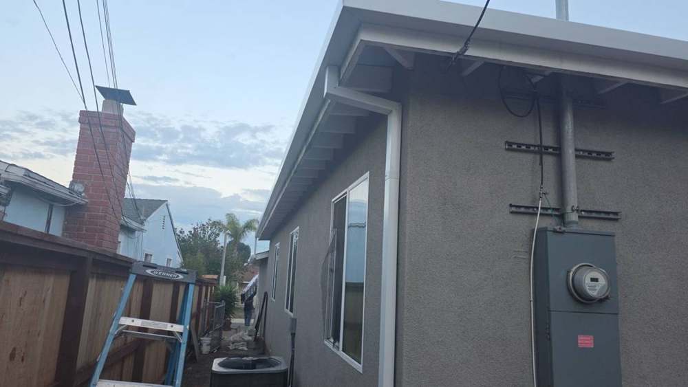 Seamless gutters + downspouts in Westchester
