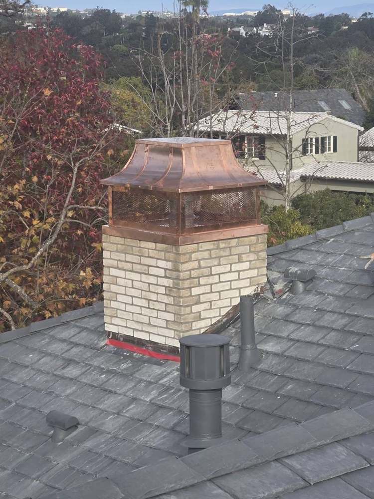 Copper chimney cap + chase cover in Pacific Palisades