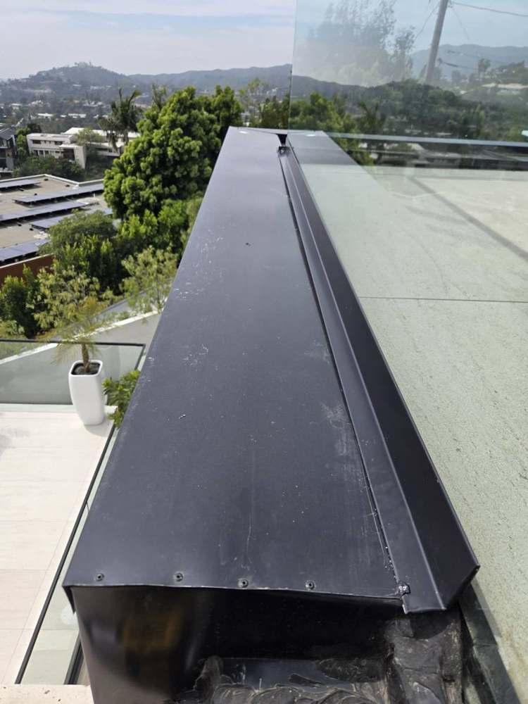 Parapet coping on roof deck in Windsor Hills