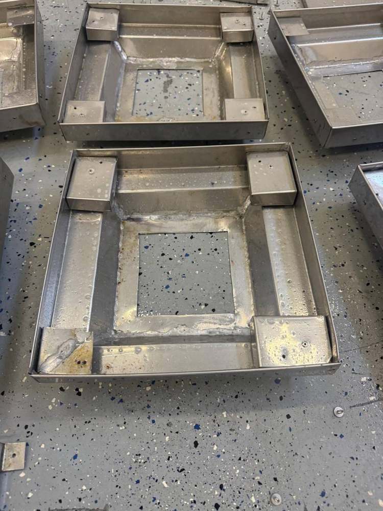 Stainless column wraps + floor access pans (commercial TI) in Downtown LA