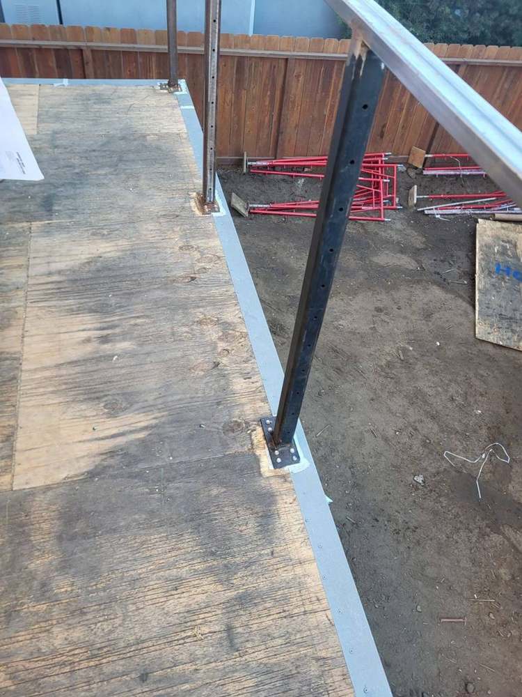 Deck edge flashing / parapet cap in Pico-Robertson